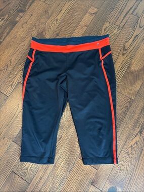 Fila Blue Capri Leggings with Orange Waistband and Side Stripes
